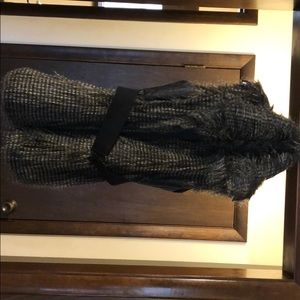 Leather with feathers vest